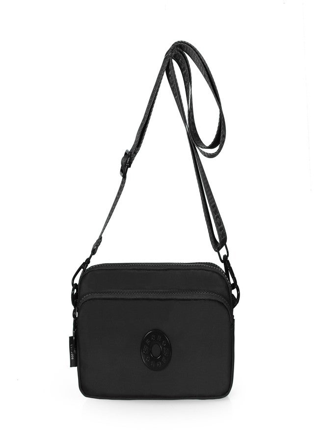 حقيبة كروس صغيرة للنساء من BAG IN - حقيبة كتف من النايلون خفيف الوزن مع حزام قابل للتعديل وجيب أمامي بسحاب - للسفر والاستخدام اليومي (أسود) - Image 1